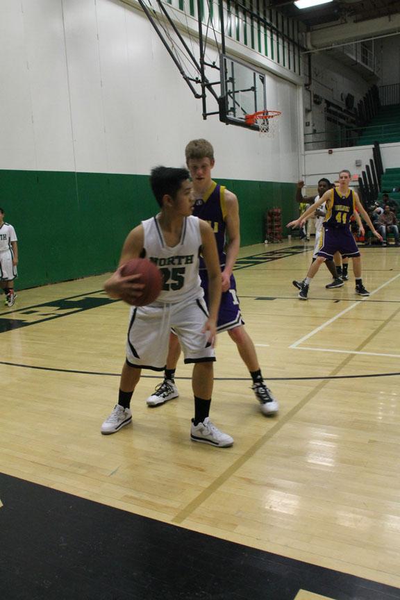 Sophomore Ryan Thammathy backs his defender up in a game against Indianola.