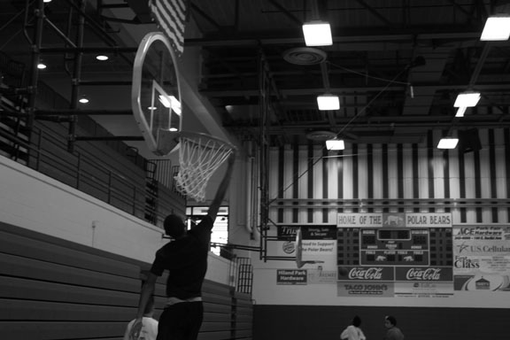 Sophomore Keon Lowe attempts to dunk during lunch.