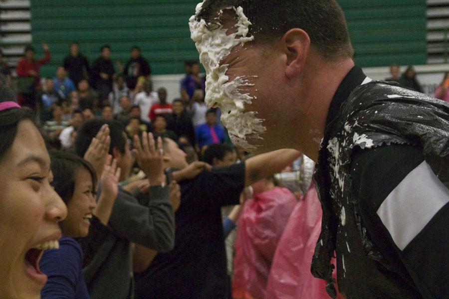 School Improvement Leader Ben Graeber gets pied in the face for charity. With at least a $1 donation to UNICEF, students got the chance to pie their favorite teacher in the face. 