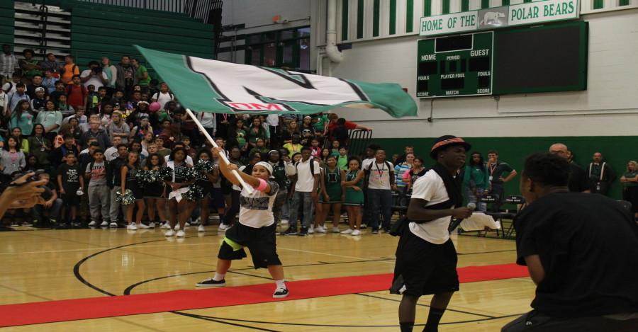 Mikey Neal celebrates the senior spirit stick win by waving the North flag.