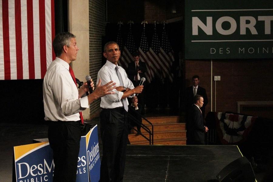 Obama and Duncan talking together about the importance of college and methods to pay for the education.