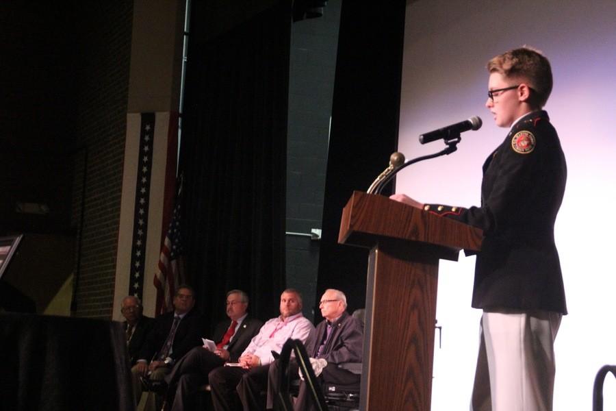 Sophomore Nicole Masteller speaks to students, staff and visitors at 2015 Veterans Day Assembly at North High, Nov. 12. 