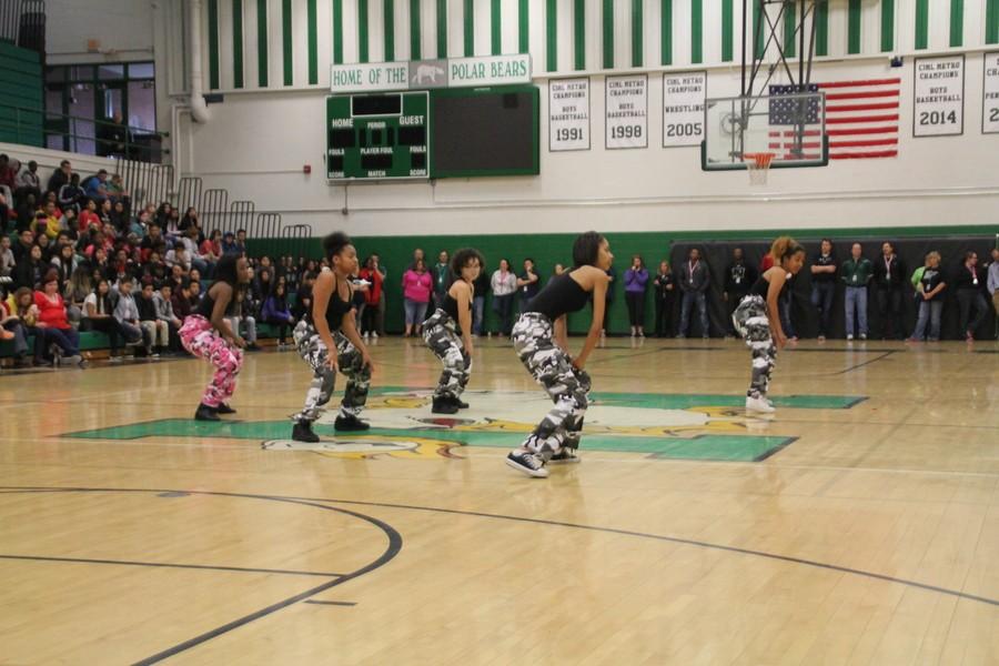 The North High dancers perform a routine during the pep rally. 