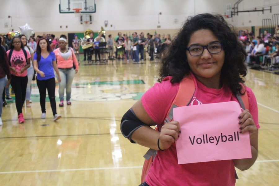 Junior, Valeria Guerra leads volleyball team during the fall sports introductions.